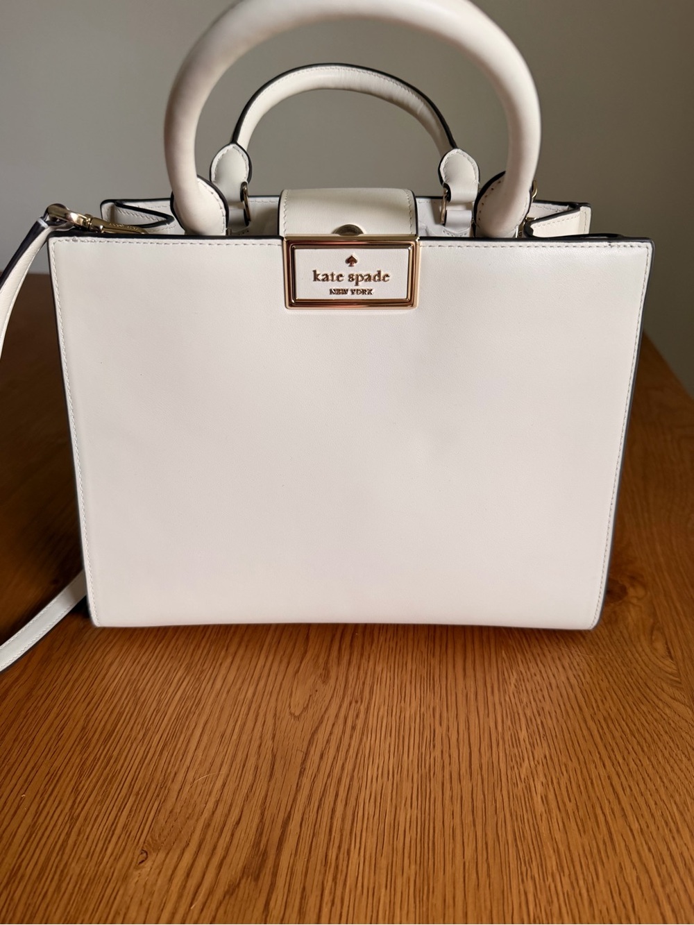 kate spade cream leather top-handle satchel with gold plaque